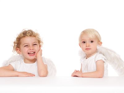 Two cherubs - stock photo