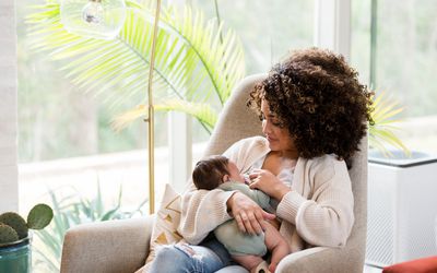 Woman breastfeeding baby