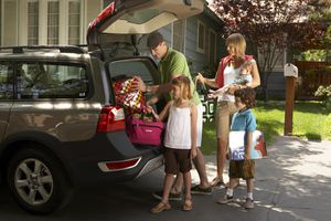 Family packing car for trip