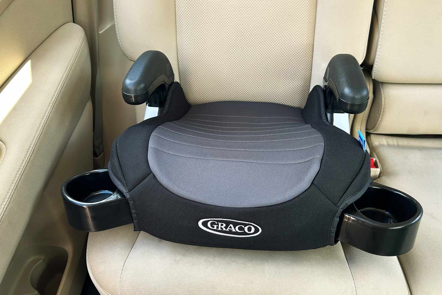 The Graco TurboBooster 2.0 Backless Booster installed in the backseat of a car