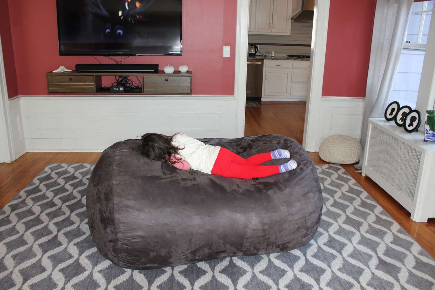 three post bean bag chair and child