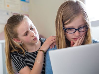 preteen girls dealing with cyberbullying