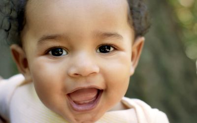 dark-skinned baby boy close-up