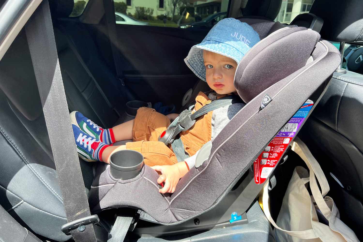 Child buckled into Safety 1st Grow and Go All-in-One Convertible Car Seat in car