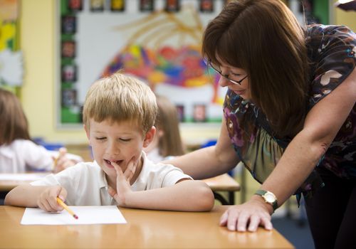 Young student and teacher