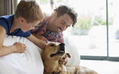 Parent with dog and child