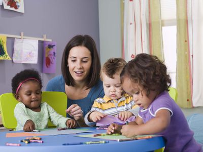 Teacher and toddlers in daycare