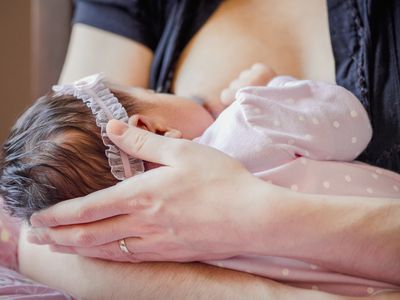 Parent breastfeeding their baby