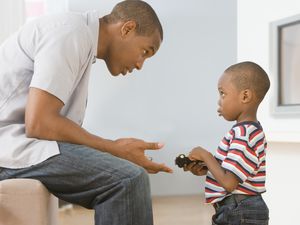 father talking to son