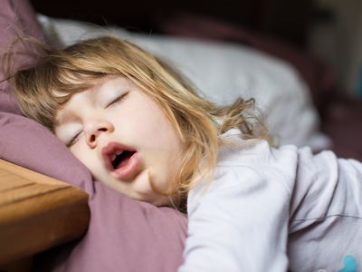 Child sleeping with mouth open