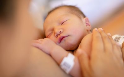 newborn with mother in hospital