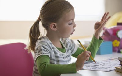 girl doing math homework