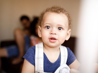 portrait of a baby by the window