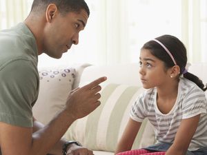 Father lecturing daughter