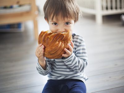 young child with bread