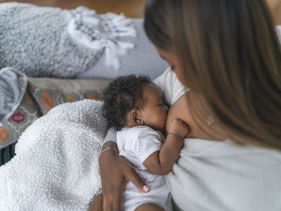 Woman nursing her infant