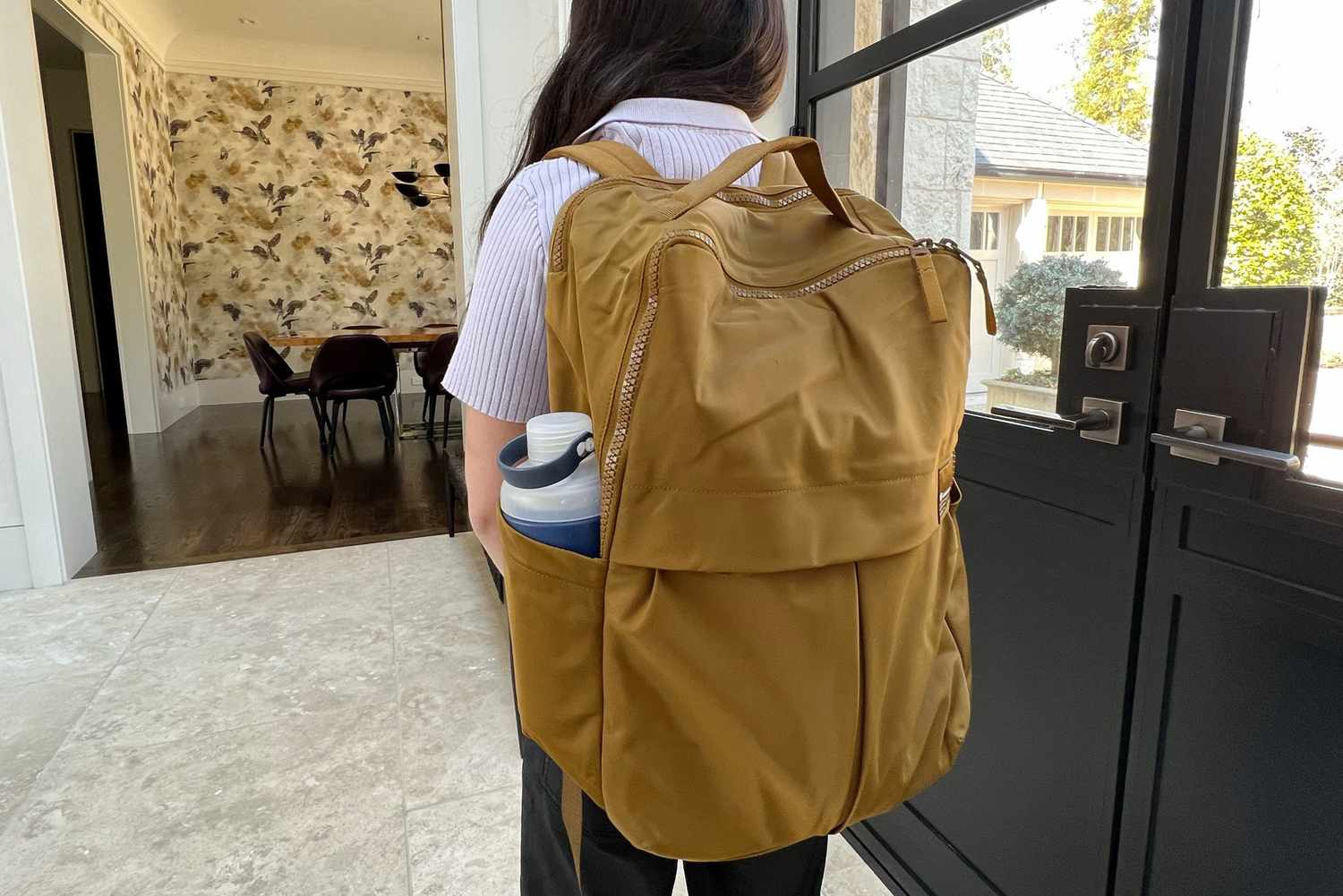 A student wearing the lululemon Everyday Backpack 2.0