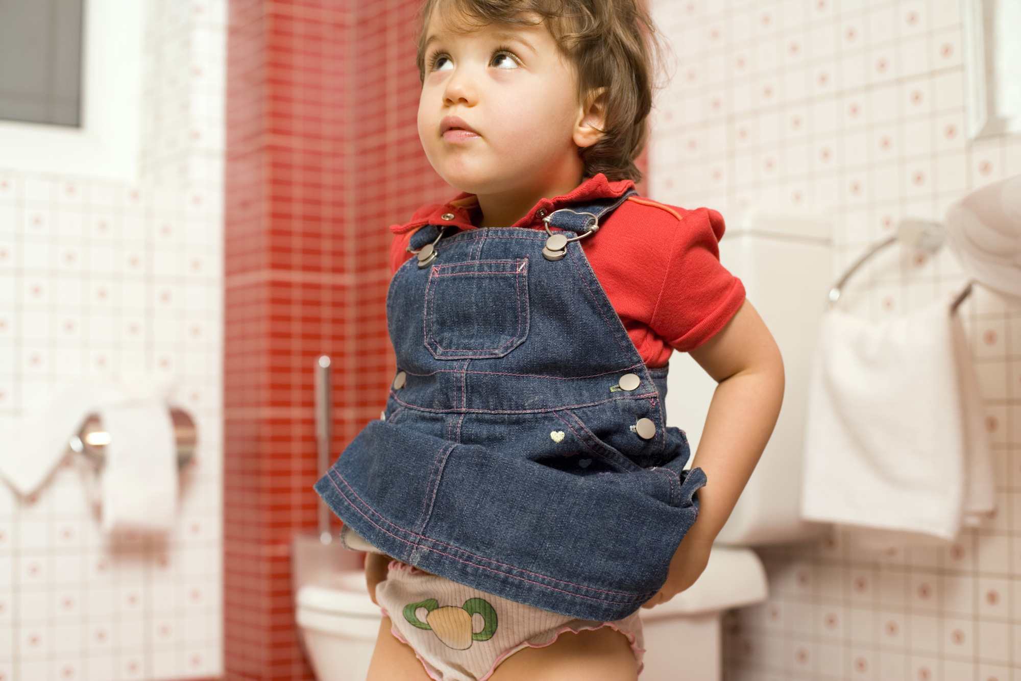 Girl using toilet