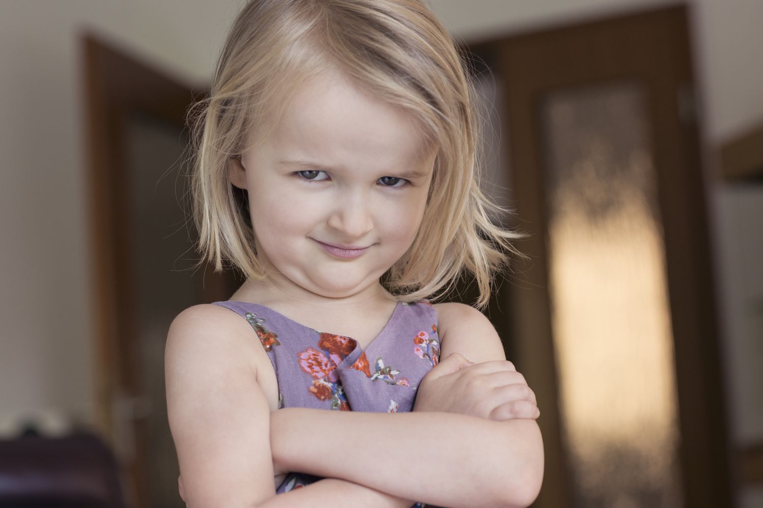 bossy little girl with arms crossed