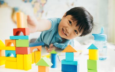 Toddler playing with blocks