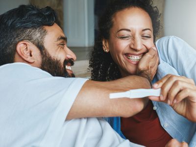 couple with positive pregnancy test