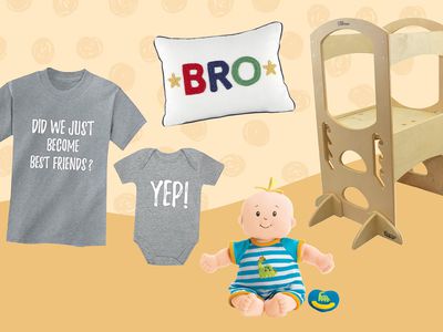 A variety of sibling gifts from the new baby on an orange background