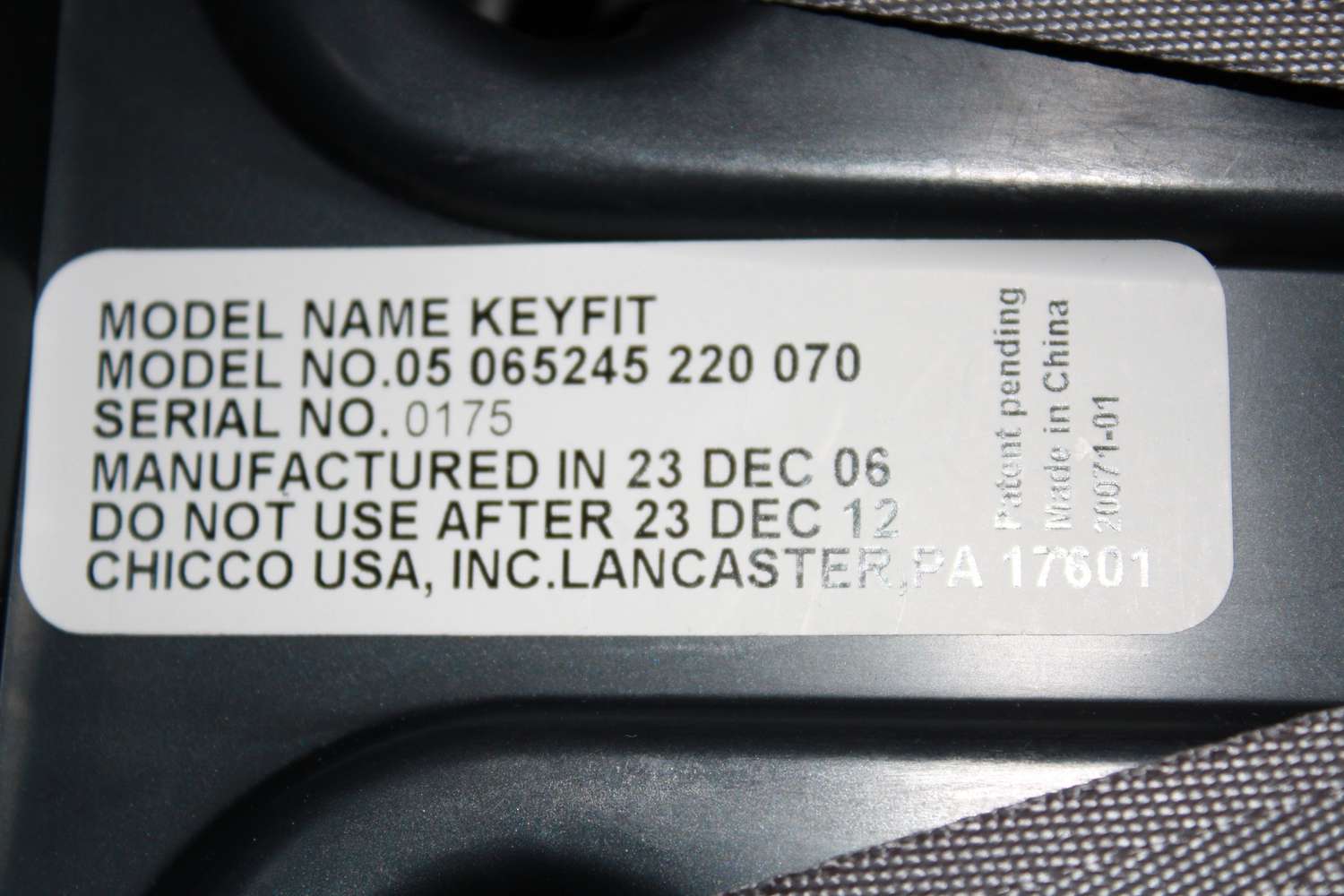 Sticker on car seat with all needed information to register