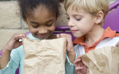 children looking in lunch bag