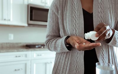 Woman taking medication