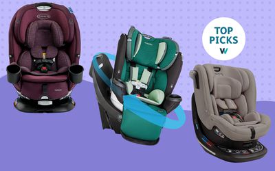 Three multicolored rotating car seats against a purple background.