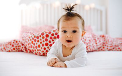 baby girl with pig tail