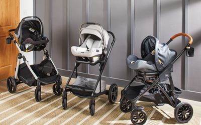 Side by side of three stroller car seat combos we recommend displayed in a carpeted entranceway near a wooden door