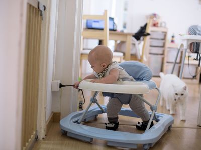 Baby pulling electricity cord