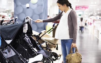 Woman shopping for stroller