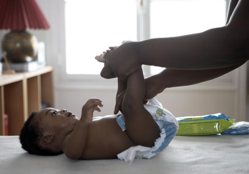 Baby having his diaper changed