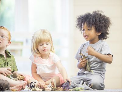 Toddlers learning to share toys