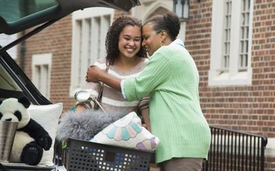 grandmother and granddaughter saying goodbye at college