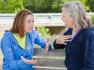 A mother and adult daughter arguing