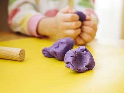 Child playing with playdough