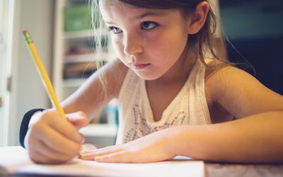 Young girls doing her homework