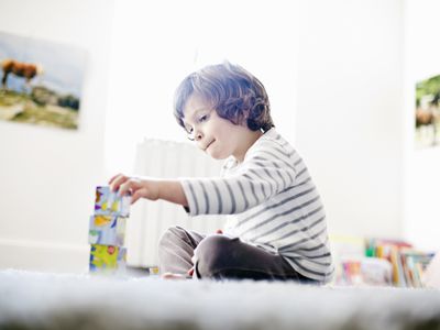 boy playing with blocks