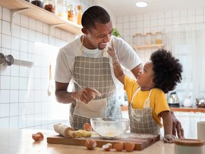 Father and child baking