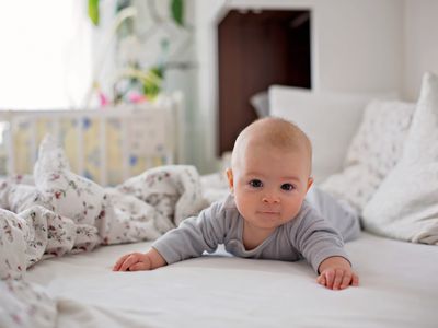 baby tummy time on bed