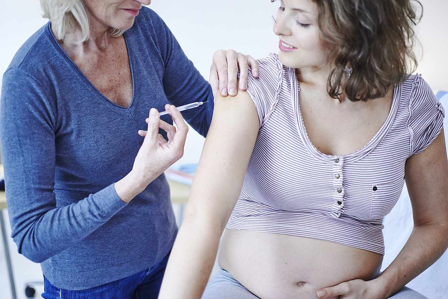 Pregnant Woman getting Vaccination