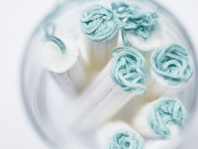 Close up of tampons in glass