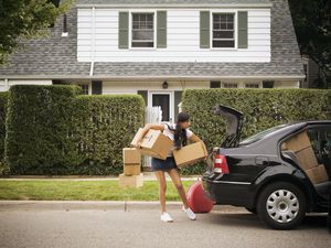 Young woman moving out