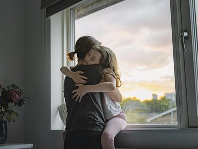 Mother and daughter embracing