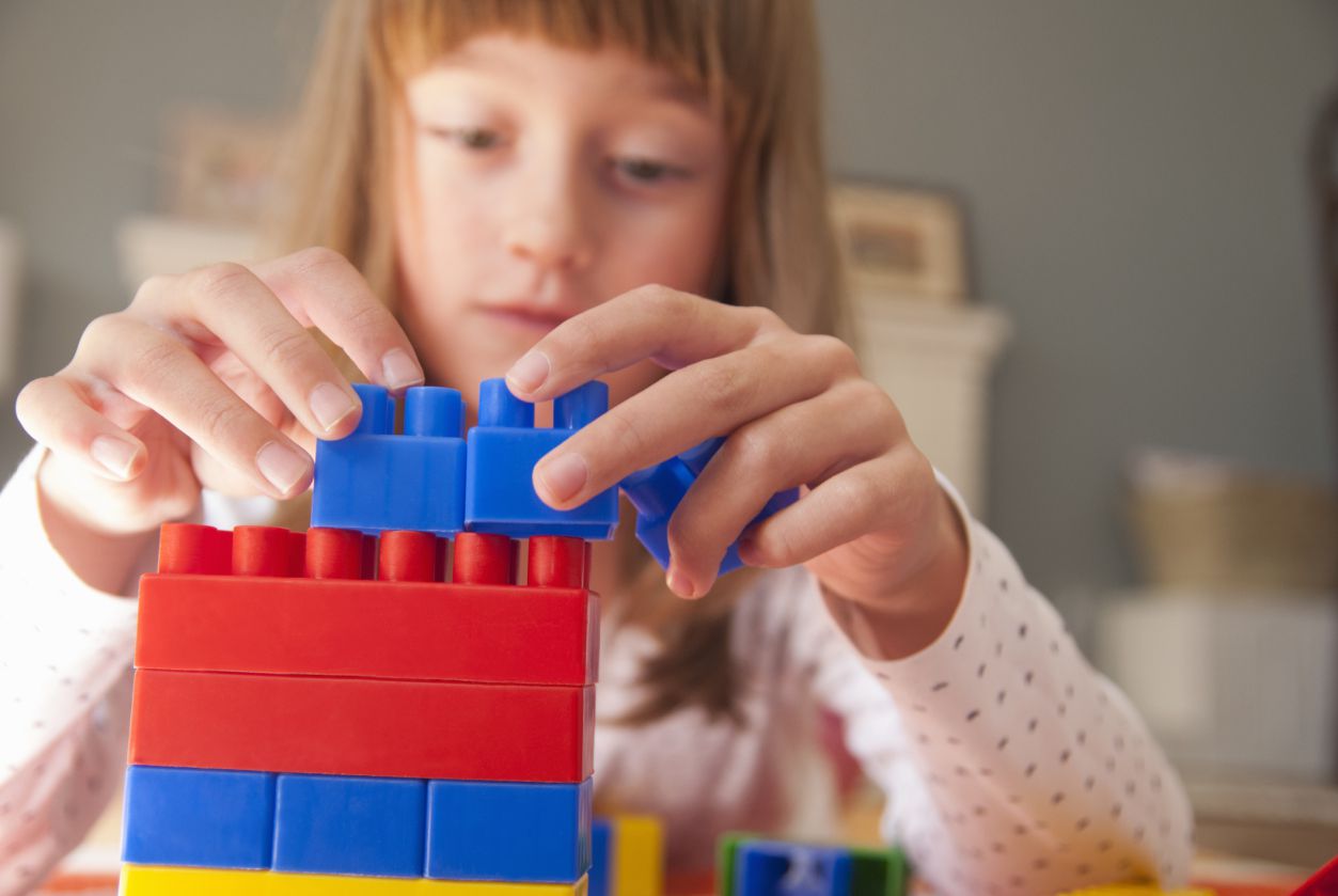 Child building with blocks