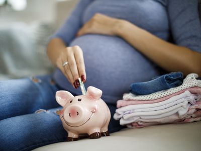 Pregnant woman saving money