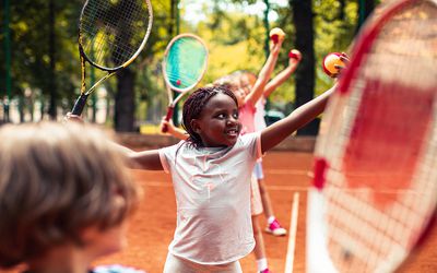 Kids playing tennis